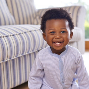 Baby at home. Shot of an adorable little baby boy at home.