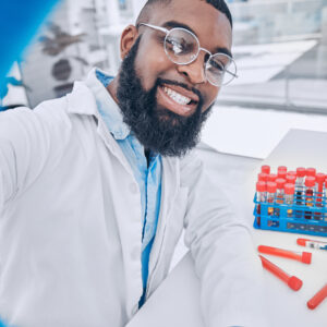 Scientist, selfie and man with blood research and happy from medical and healthcare work. African m